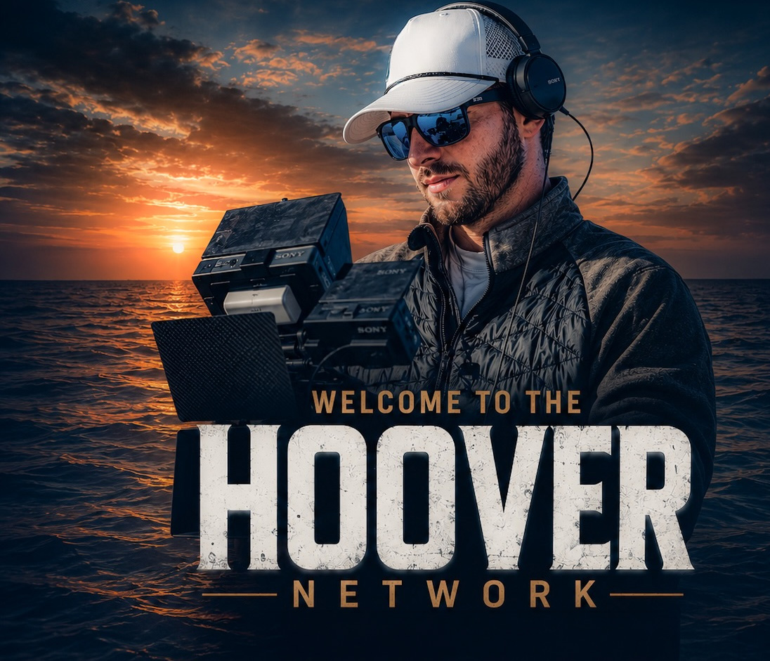 Mac Hoover operating a camera offshore at sunset